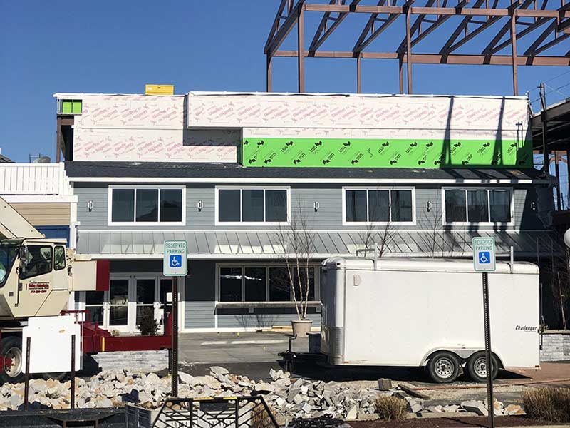 Front view of small, one-story commercial building being constructed by Tier 1 Construction